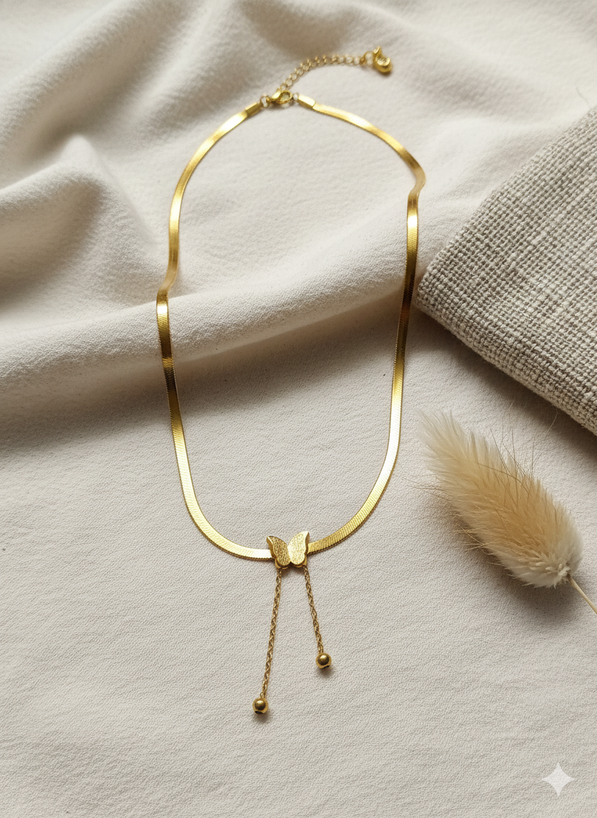🦋 The Auric Grace Necklace – Golden Wings of Elegance